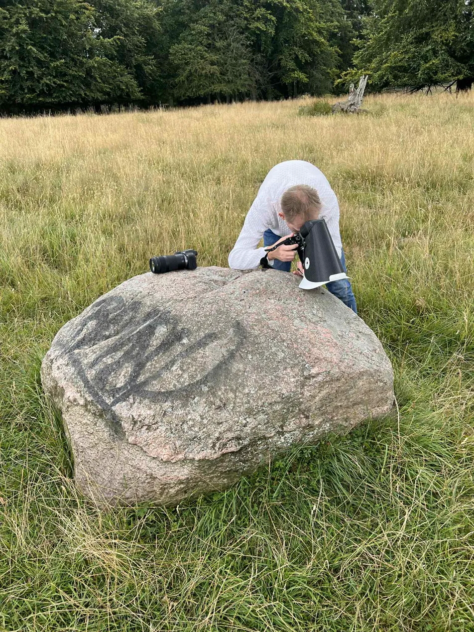 Bo Nexoe photographing in the field